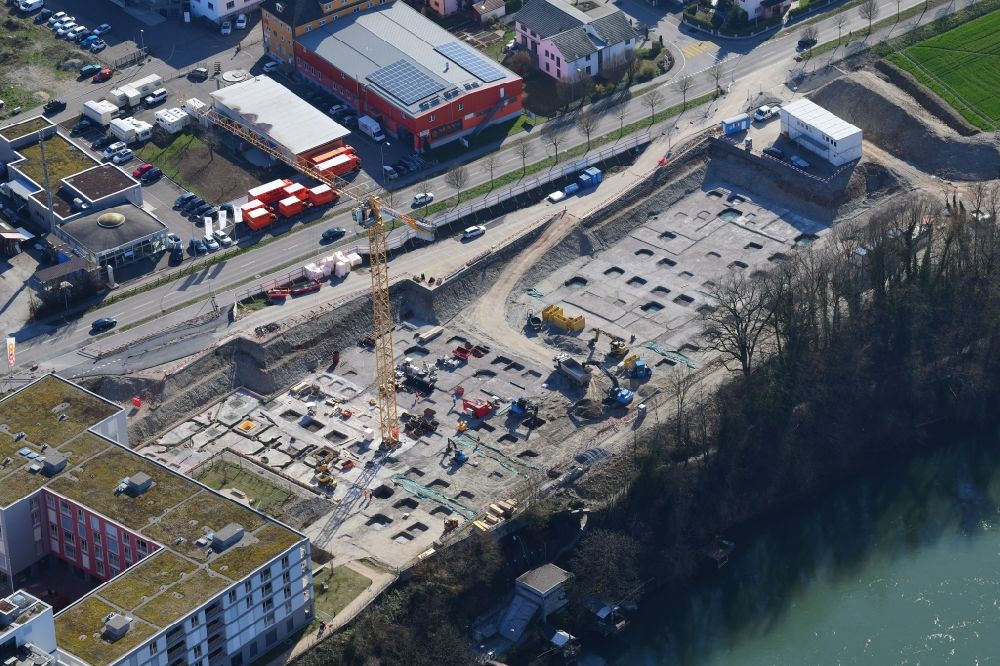 Rheinfelden from the bird's eye view: Expansion of the residential and commercial building district Salmenpark at the river Rhine in Rheinfelden in the canton Aargau, Switzerland