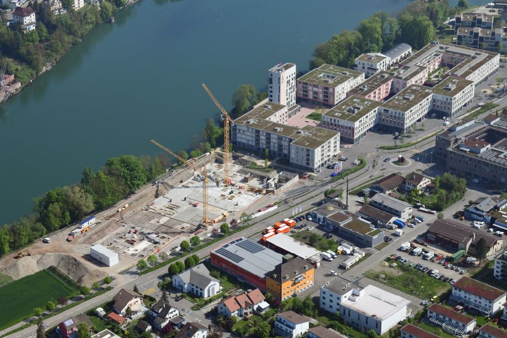 Rheinfelden from the bird's eye view: Expansion of the residential and commercial building district Salmenpark at the river Rhine in Rheinfelden in the canton Aargau, Switzerland
