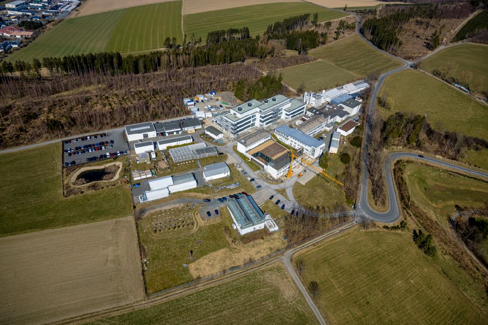 Grafschaft from the bird's eye view: Extension of new building site at the building complex of the institute Fraunhofer-Institut fuer Molekularbiologie and Angewandte Oekologie in Grafschaft at Sauerland in the state North Rhine-Westphalia, Germany
