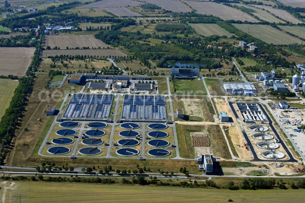 Schönefeld from the bird's eye view: New construction site and extension of the sewage treatment basins and purification stages Berliner Wasserbetriebe Klaerwerk Wassmannsdorf in the district Wassmannsdorf in Schoenefeld in the state Brandenburg, Germany