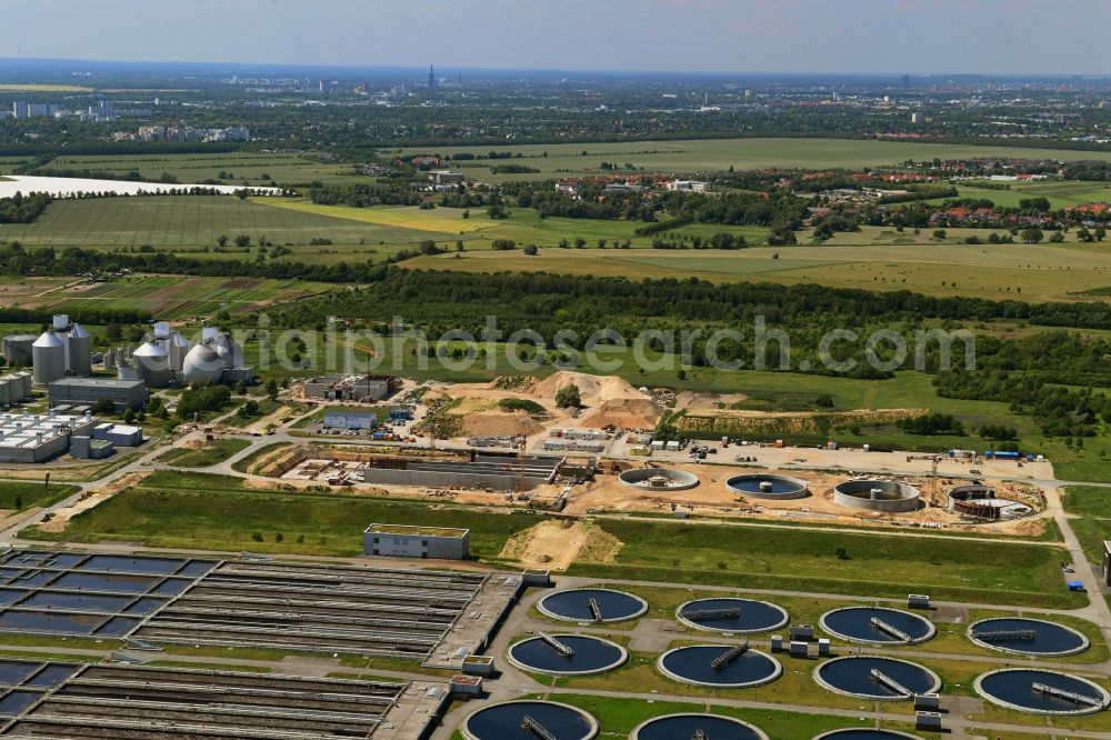 Aerial photograph Schönefeld - New construction site and extension of the sewage treatment basins and purification stages Berliner Wasserbetriebe Klaerwerk Wassmannsdorf in Wassmannsdorf in the state Brandenburg, Germany