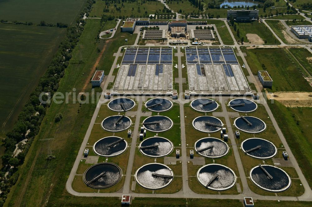 Aerial image Schönefeld - New construction site and extension of the sewage treatment basins and purification stages Berliner Wasserbetriebe Klaerwerk Wassmannsdorf in Wassmannsdorf in the state Brandenburg, Germany