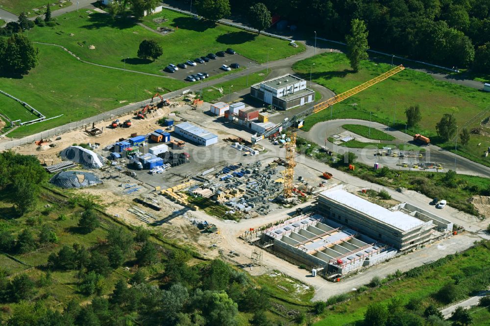 Münchehofe from above - Construction site for the new construction of a flocculation filtration for the expansion of the sewage treatment plant basin and cleaning stages for the waste water treatment of the Berliner Wasserbetriebe on Dahlwitzer Landstrasse in Muenchehofe in the state Brandenburg, Germany