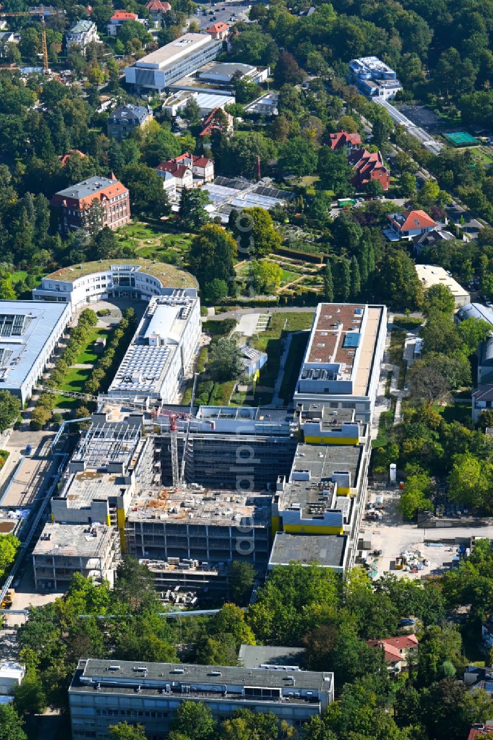 Berlin from above - Extension new construction site at the building complex of the Institute for Chemistry and Biochemistry - Organic and Physical Chemistry on the campus of the Free University of Berlin on Takustrasse in the district Dahlem in Berlin, Germany