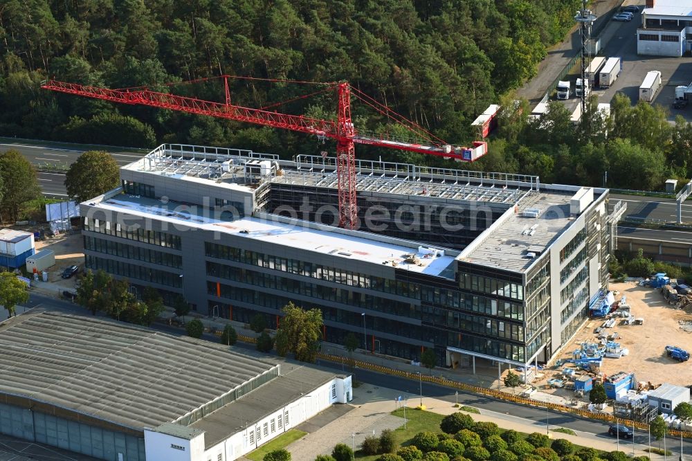 Braunschweig from the bird's eye view: Extension of new building site at the building complex of the institute Fraunhofer-Projektzentrum fuer Energiespeicher und Systeme ZESS on Hermann-Blenk-Strasse in the district Kralenriede in Brunswick in the state Lower Saxony, Germany