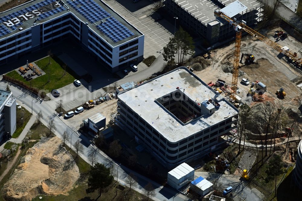 Aerial photograph Nürnberg - Extension of new building site at the building complex of the institute Fraunhofer-Institut fuer Integrierte Schaltungen IIS on Nordostpark in the district Schafhof in Nuremberg in the state Bavaria, Germany