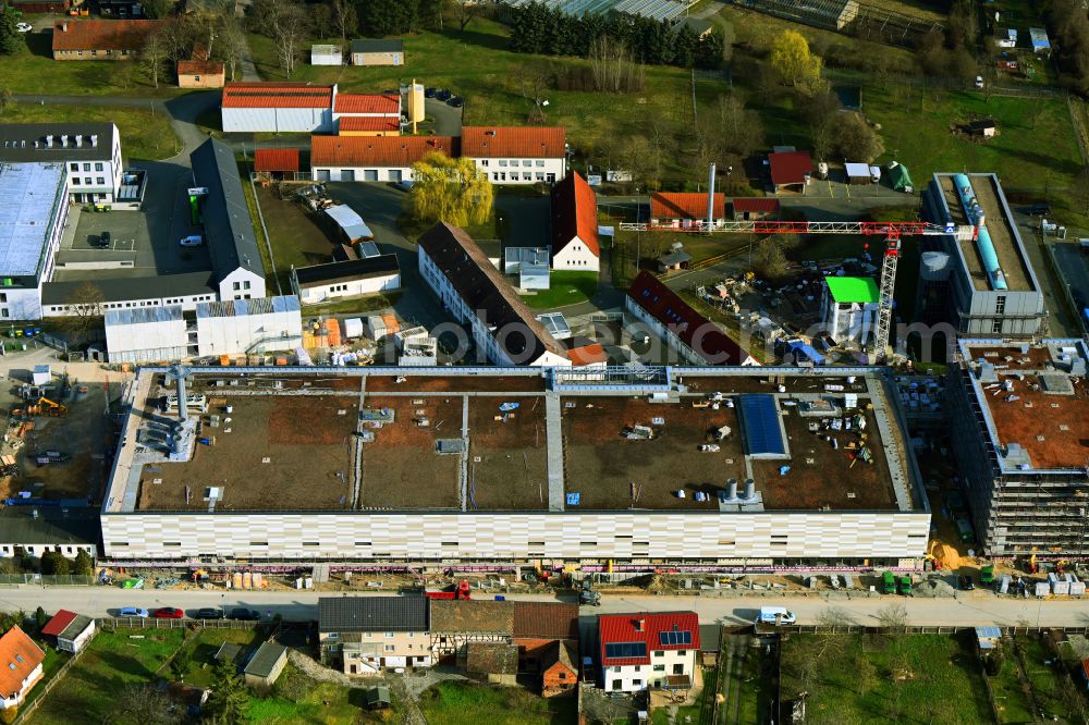 Jena from above - Extension of new building site at the building complex of the institute Friedrich-Loeffler-Institut Bundesforschungsinstitut fuer Tiergesundheit on street Naumburger Strasse - Flurweg in Jena in the state Thuringia, Germany