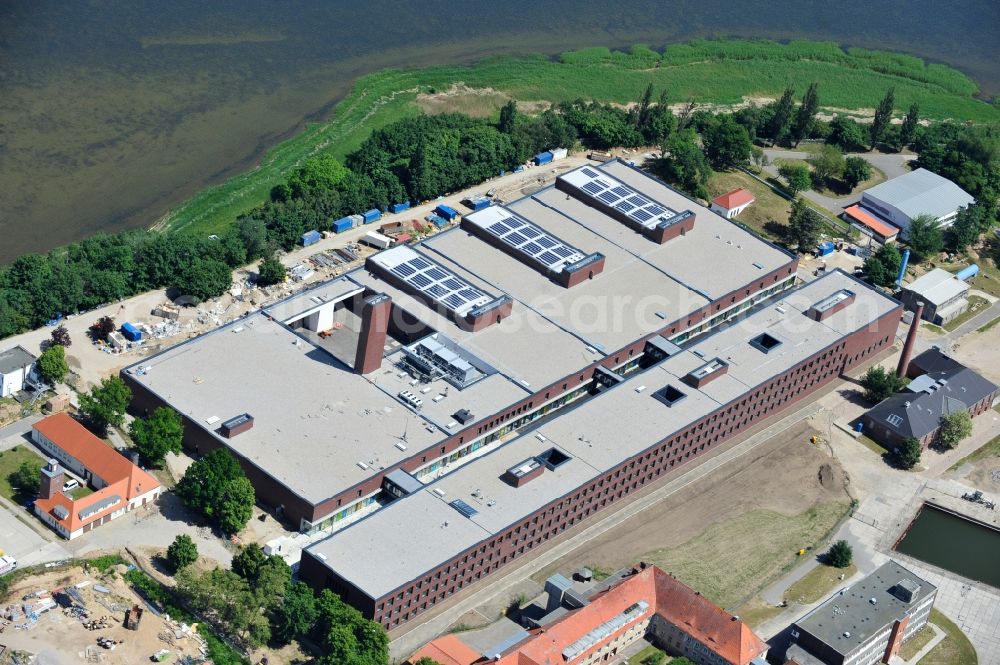 Riems from above - Extension of new building site at the building complex of the institute Friedrich-Loeffler-Institutes FLI in Riems in the state Mecklenburg - Western Pomerania, Germany