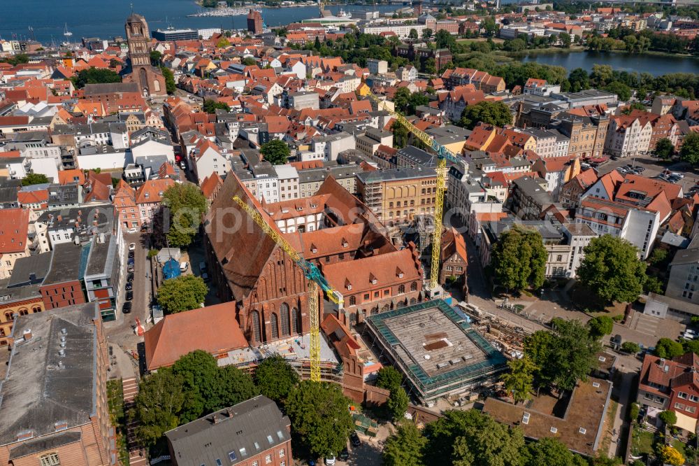Hansestadt Stralsund from above - Extension new construction site at the museum building ensemble Stralsund Museum and Maritime Museum on the street Bielkenhagen in the district Andershof in the Hanseatic City of Stralsund in the state Mecklenburg - Western Pomerania, Germany. The cultural-historical museum of the Hanseatic city of Stralsund is located in parts of the former medieval St. Catherine's Monastery and the adjacent former Ernst Moritz Arndt School in the core area of a??a??the city area, which has been recognized by UNESCO as a World Heritage Site