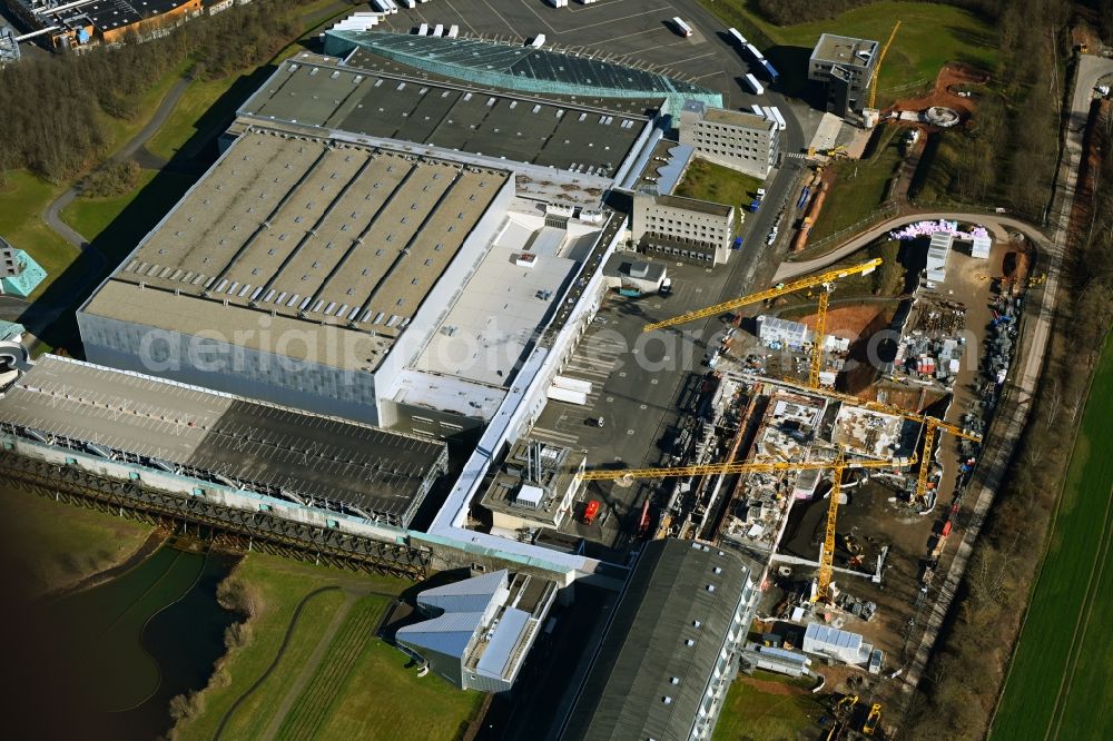 Aerial image Melsungen - Extension - new building - construction site on the factory premises of B. Braun Melsungen AG on Carl-Braun-Strasse in the district Adelshausen in Melsungen in the state Hesse, Germany