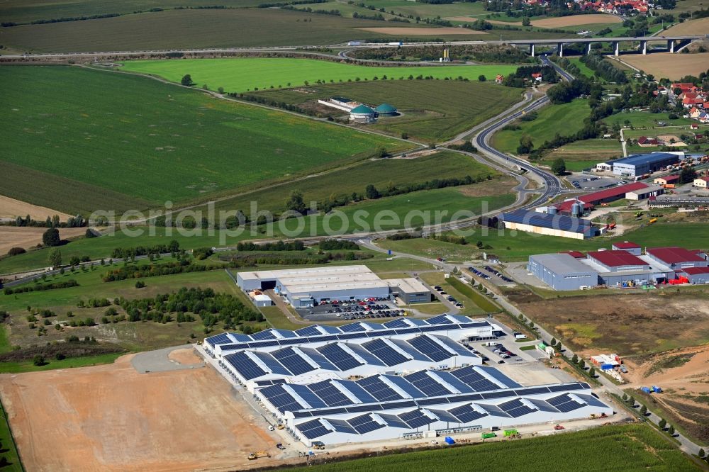 Aerial photograph Grabfeld - Extension - new building - construction site on the factory premises of DEKO Messezentrum AG Im Oberen Weidig in the district Queienfeld in Grabfeld in the state Thuringia, Germany