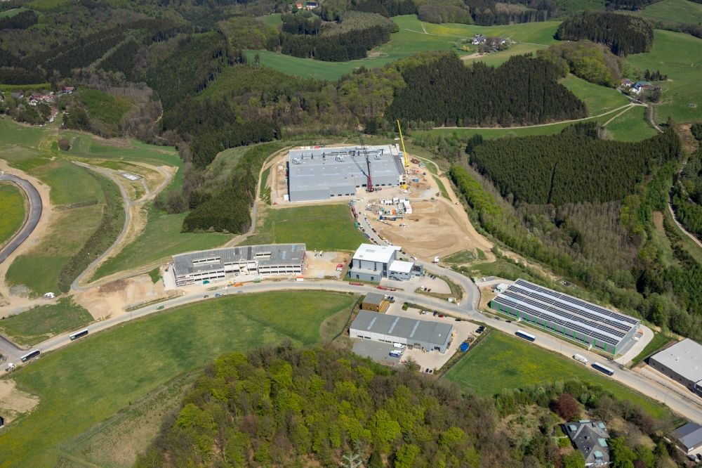 Altena from the bird's eye view: Extension - new building - construction site on the factory premises in the commercial area in Rosmart in the state North Rhine-Westphalia, Germany
