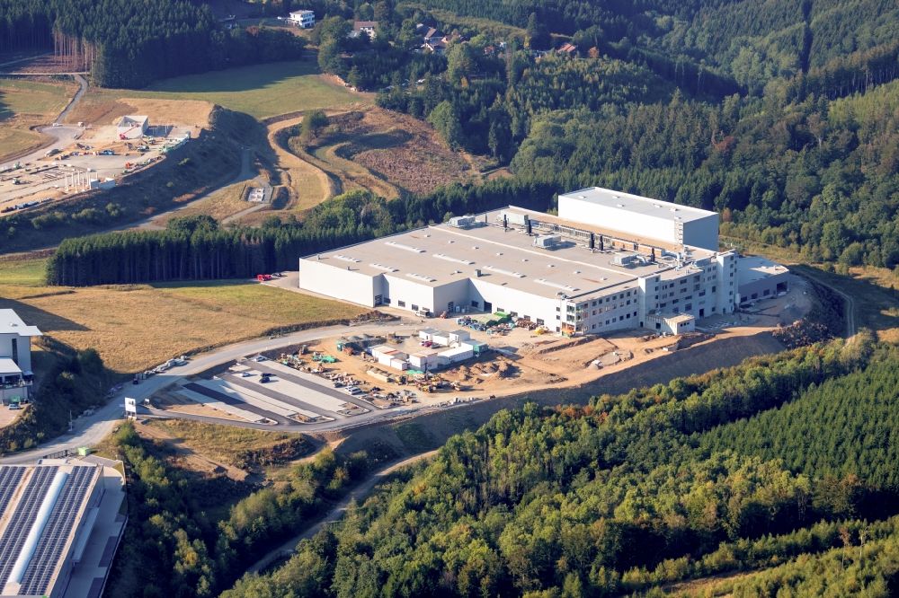 Aerial photograph Altena - Extension - new building - construction site on the factory premises in the commercial area in Rosmart in the state North Rhine-Westphalia, Germany
