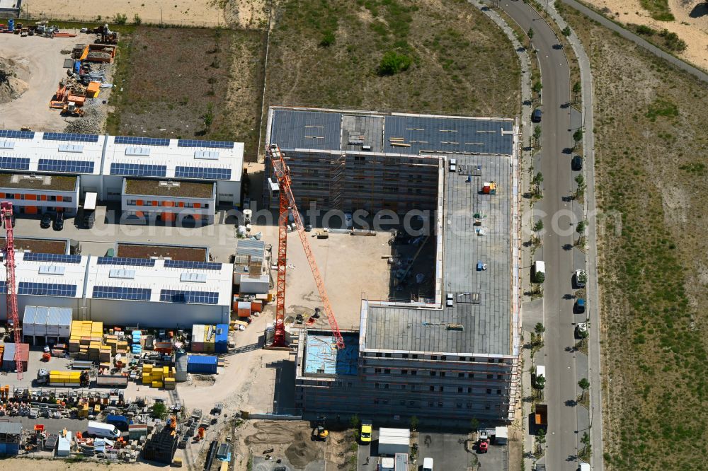 Aerial photograph Berlin - Extension - new building - construction site on the factory premises of Hirsch + Lorenz Ingenieurbau GmbH on Gerhard-Sedlmayr-Strasse on street Gross-Berliner Damm in the district Johannisthal in Berlin, Germany