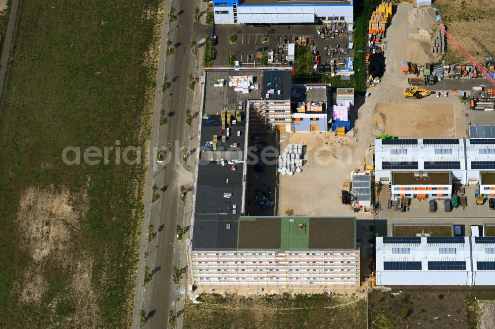 Aerial photograph Berlin - Extension - new building - construction site on the factory premises of Hirsch + Lorenz Ingenieurbau GmbH on Gerhard-Sedlmayr-Strasse on street Gross-Berliner Damm in the district Johannisthal in Berlin, Germany