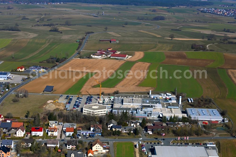 Mistelgau from the bird's eye view: Extension - new building - construction site on the factory premises Kennametal GmbH & Co. KG in Mistelgau in the state Bavaria, Germany