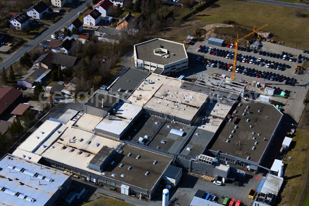 Mistelgau from the bird's eye view: Extension - new building - construction site on the factory premises Kennametal GmbH & Co. KG in Mistelgau in the state Bavaria, Germany