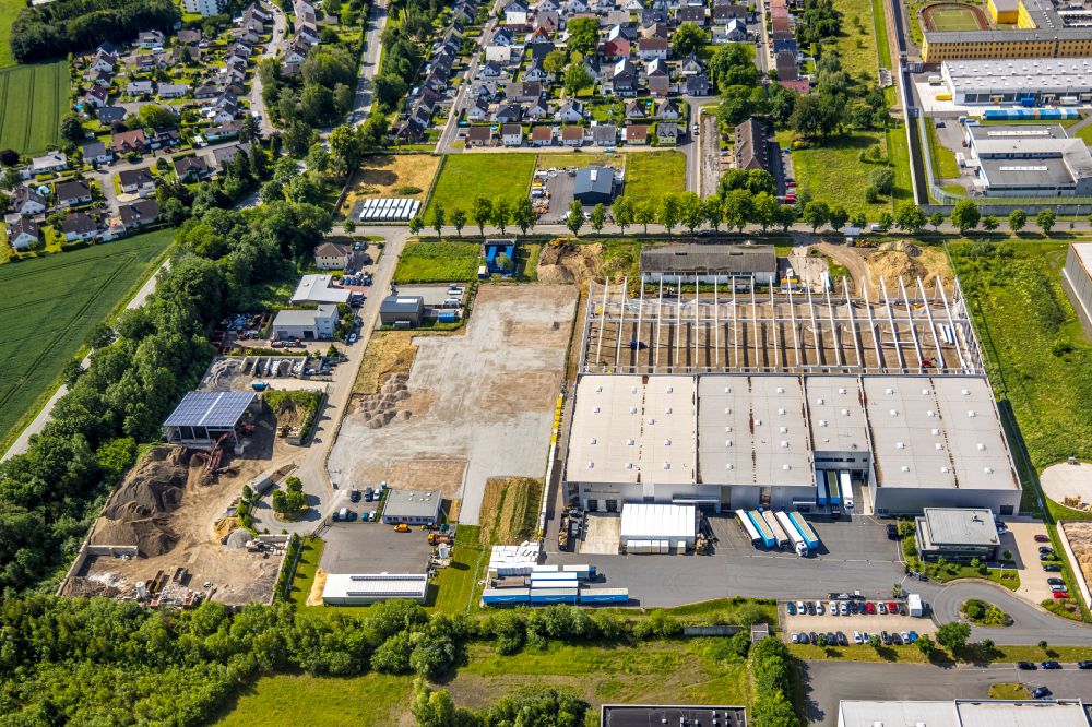 Werl from the bird's eye view: Extension - new building - construction site on the factory premises Kulle Logistik GmbH & Co. KG on street Von-Papen-Anger in the district Westoennen in Werl at Ruhrgebiet in the state North Rhine-Westphalia, Germany