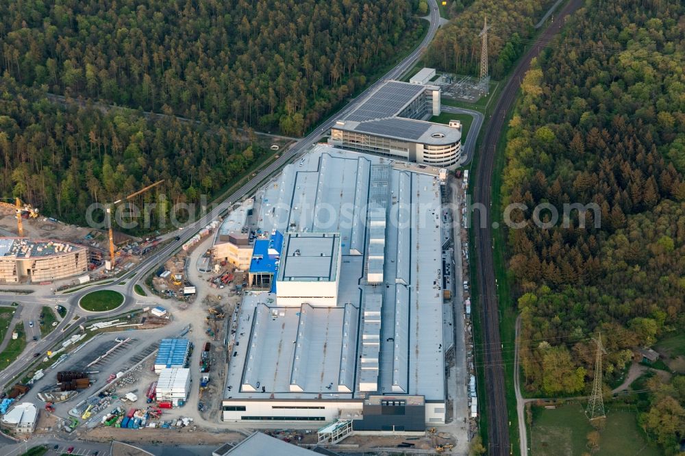 Graben-Neudorf from the bird's eye view: Extension - new building - construction site on the factory premises of SEW-EURODRIVE GmbH & Co KG in Graben-Neudorf in the state Baden-Wurttemberg, Germany