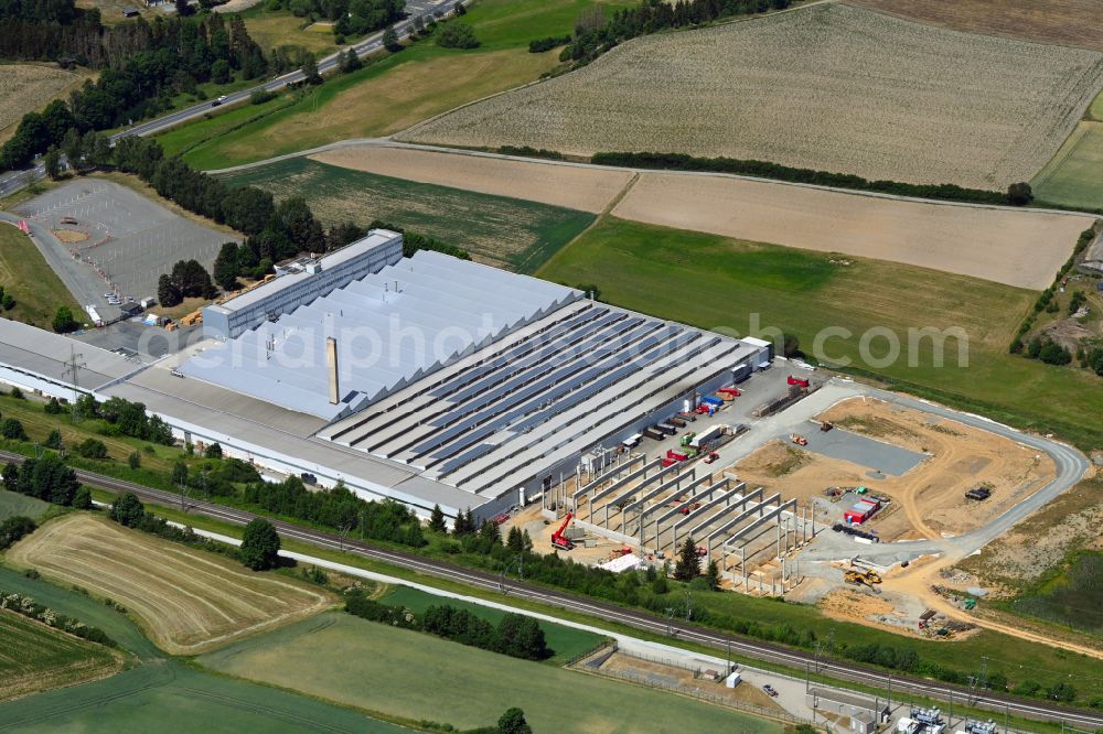 Aerial photograph Hof - Extension - new building - construction site on the factory premises Viessmann Climate Solutions SE in the district Unterkotzau in Hof in the state Bavaria, Germany