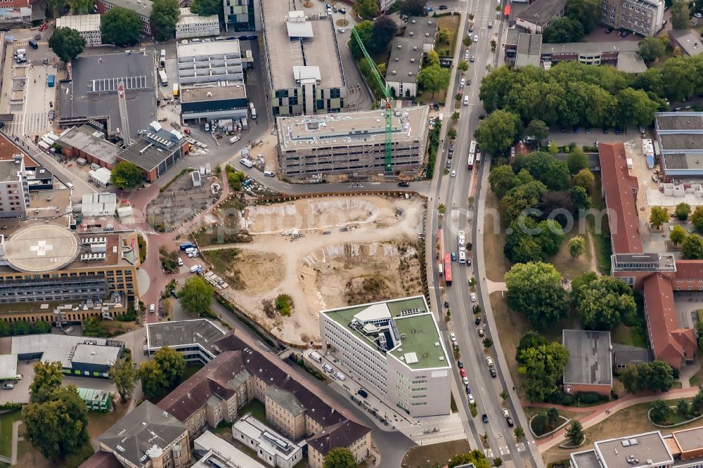 Aerial photograph Kiel - Construction site for a new extension to the hospital grounds Universitaetsklinikum Schleswig-Holstein in the district Ravensberg on street Feldstrasse in Kiel in the state Schleswig-Holstein, Germany