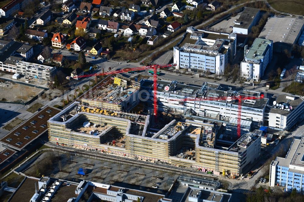 Aerial photograph Unterföhring - Expansion site on the building complex of the transmitter New Campus of ProSieben Sat.1 Media SE on Medienallee - Gutenbergstrasse in Unterfoehring in the state Bavaria, Germany