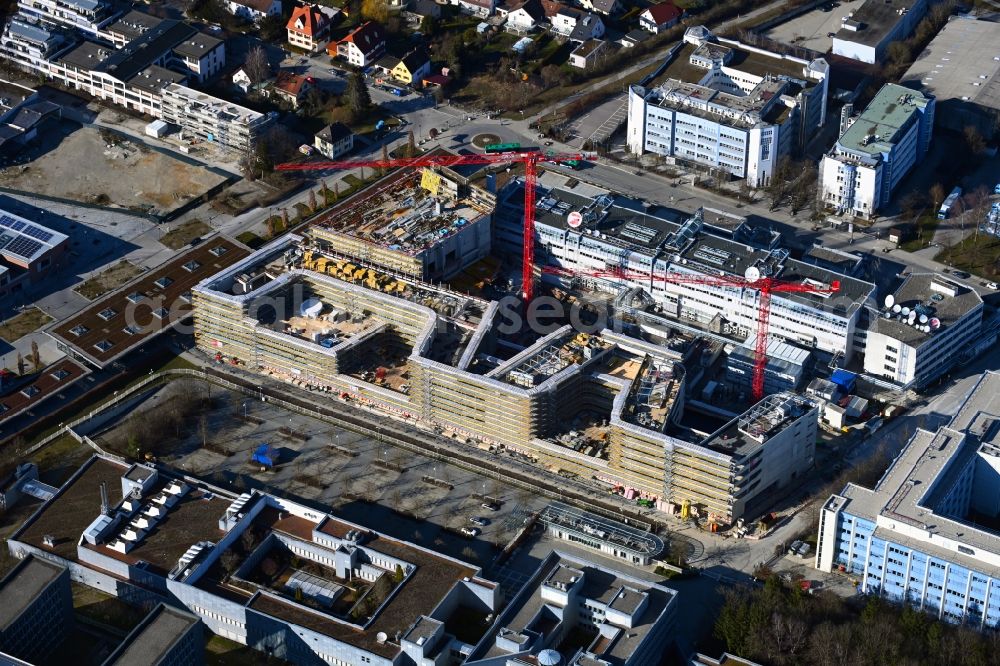 Unterföhring from above - Expansion site on the building complex of the transmitter New Campus of ProSieben Sat.1 Media SE on Medienallee - Gutenbergstrasse in Unterfoehring in the state Bavaria, Germany