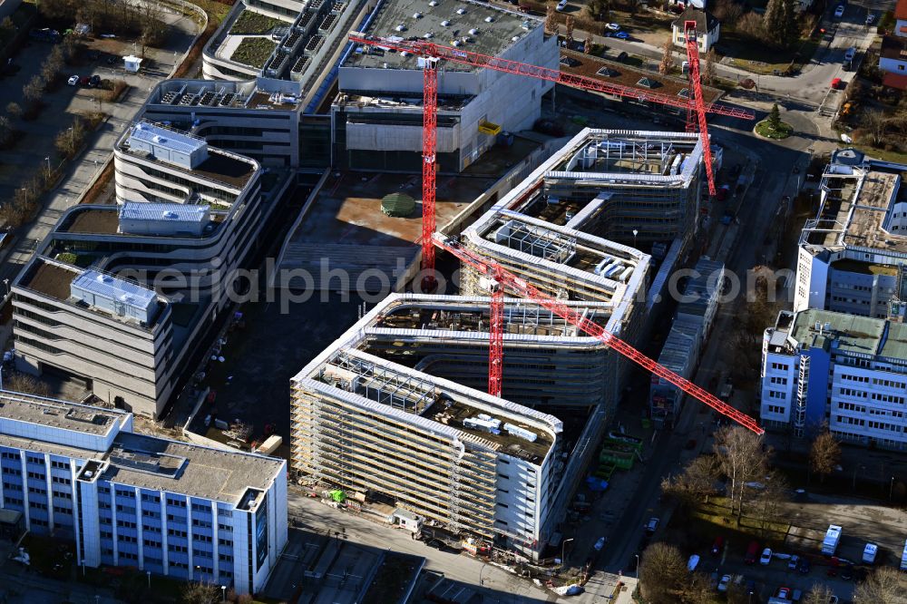 Unterföhring from above - Expansion site on the building complex of the transmitter New Campus of ProSieben Sat.1 Media SE on Medienallee - Gutenbergstrasse in Unterfoehring in the state Bavaria, Germany