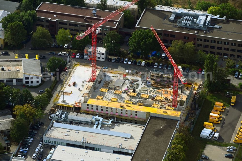 Aerial image Berlin - Construction site on building and production halls on the premises of Berliner Stadtreinigungsbetriebe on Gradestrasse in the district Britz in Berlin, Germany