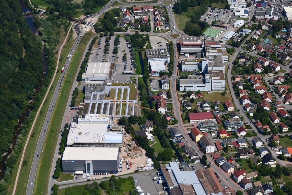 Aerial photograph Maulburg - Construction site on building and production halls on the premises of Endress+Hauser AG in Maulburg in the state Baden-Wurttemberg, Germany