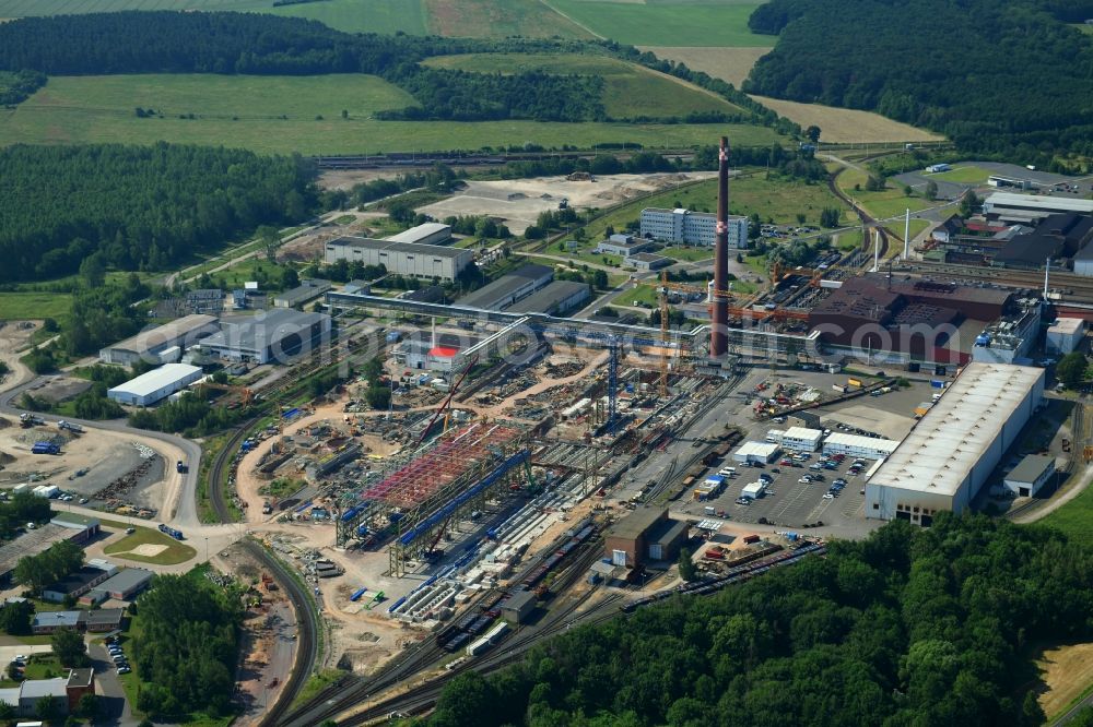 Ilsenburg (Harz) from above - Construction site on building and production halls on the premises of Ilsenburger Grobblech GmbH in Ilsenburg (Harz) in the state Saxony-Anhalt, Germany