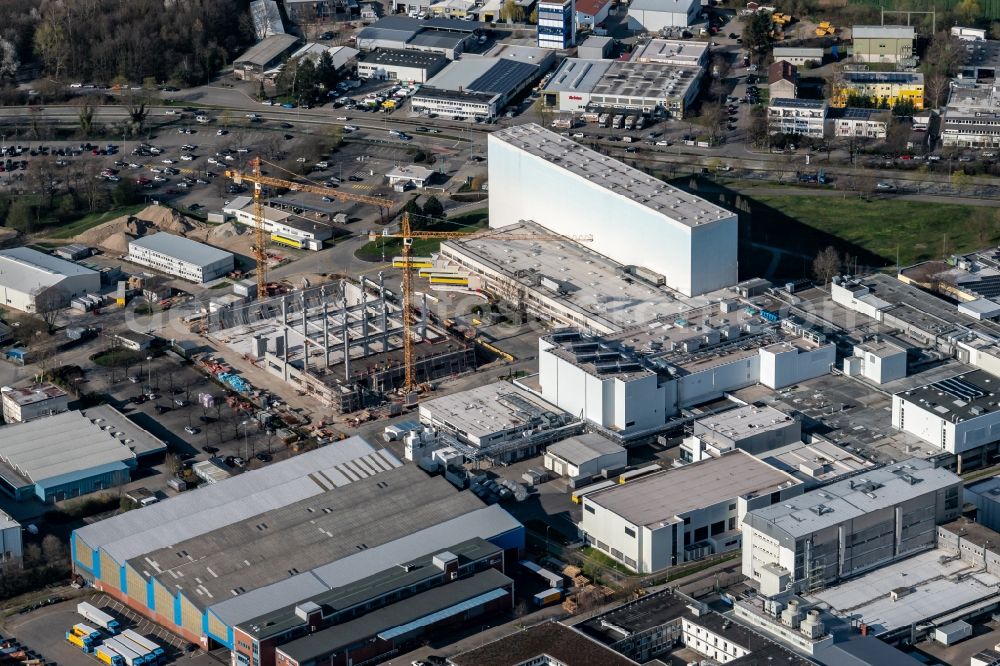 Freiburg im Breisgau from the bird's eye view: Construction site on building and production halls on the premises of Pfizer Manufacturing Deutschland GmbH in Freiburg im Breisgau in the state Baden-Wurttemberg, Germany