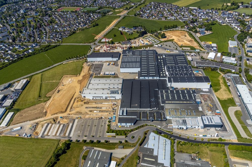 Attendorn from the bird's eye view: Construction site on building and production halls on the premises of Viega factoryes in Attendorn in the state North Rhine-Westphalia, Germany