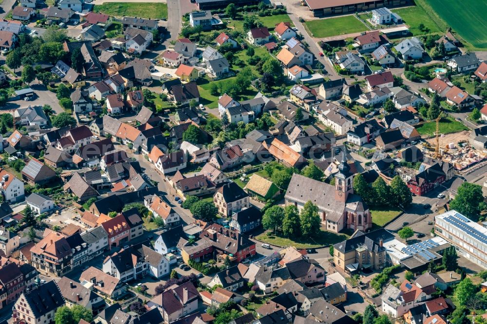 Aerial image Kippenheim - Evangelische Kirche in with the village center in Kippenheim in the state Baden-Wuerttemberg, Germany