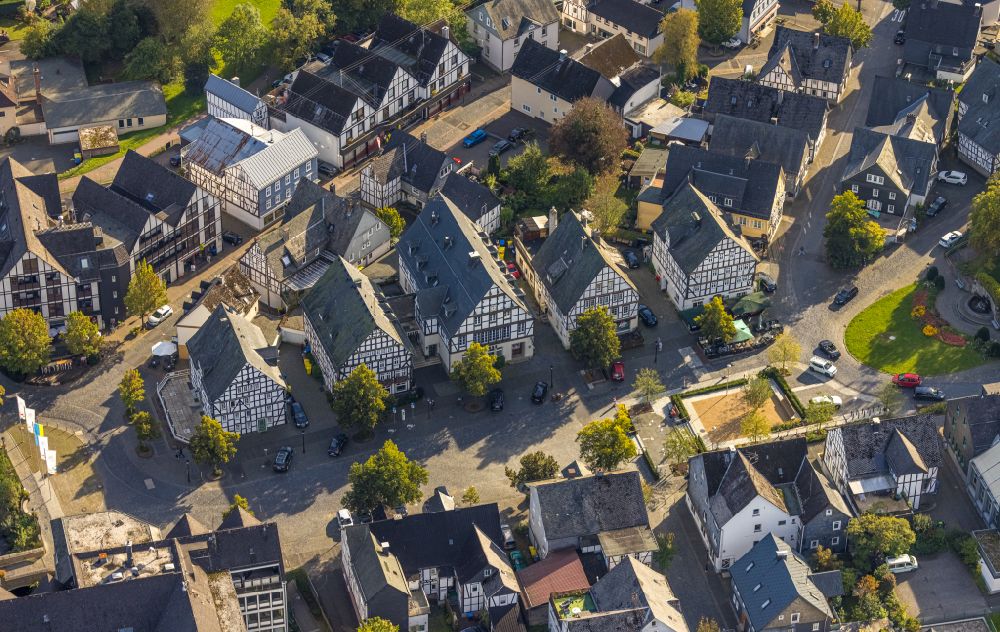 Aerial image Hilchenbach - Half-timbered house and multi-family house- residential area in the old town area and inner city center on street Markt in Hilchenbach at Siegerland in the state North Rhine-Westphalia, Germany