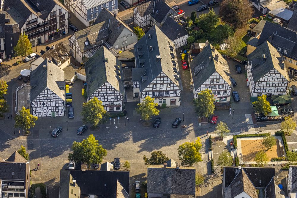 Hilchenbach from above - Half-timbered house and multi-family house- residential area in the old town area and inner city center on street Markt in Hilchenbach at Siegerland in the state North Rhine-Westphalia, Germany