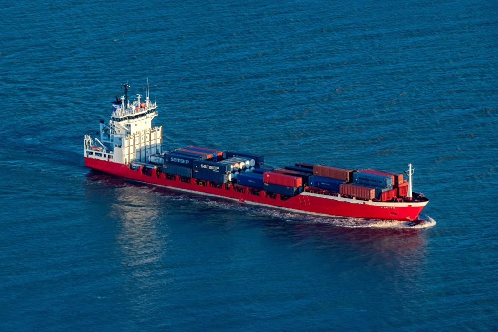 Aerial image Wedel - Sailing container ship auf of Elbe in Wedel in the state Schleswig-Holstein, Germany