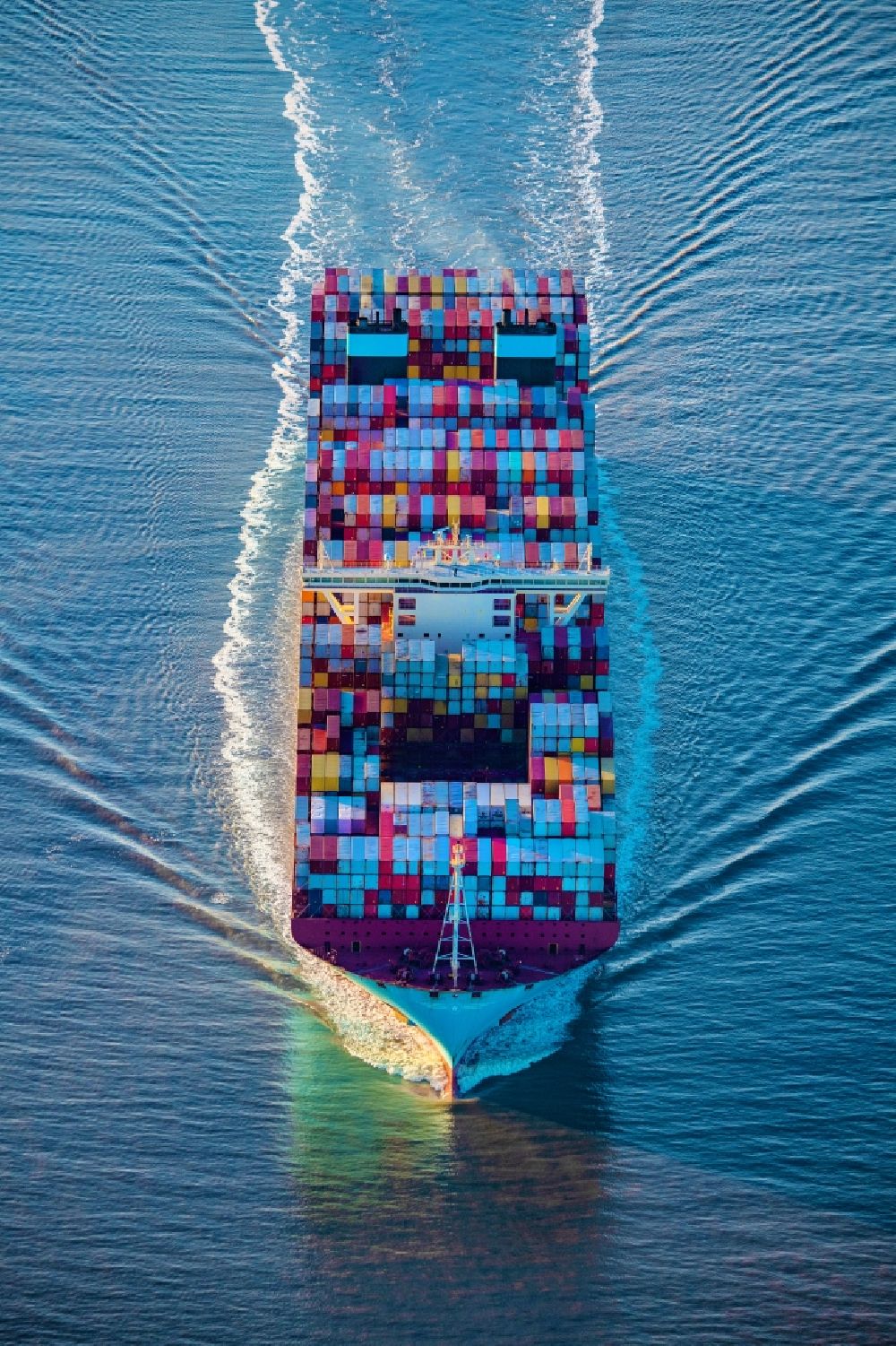 Aerial photograph Butjadingen - Moving container ship Maribor Maersk in the Weser estuary in Butjadingen in the state Lower Saxony, Germany