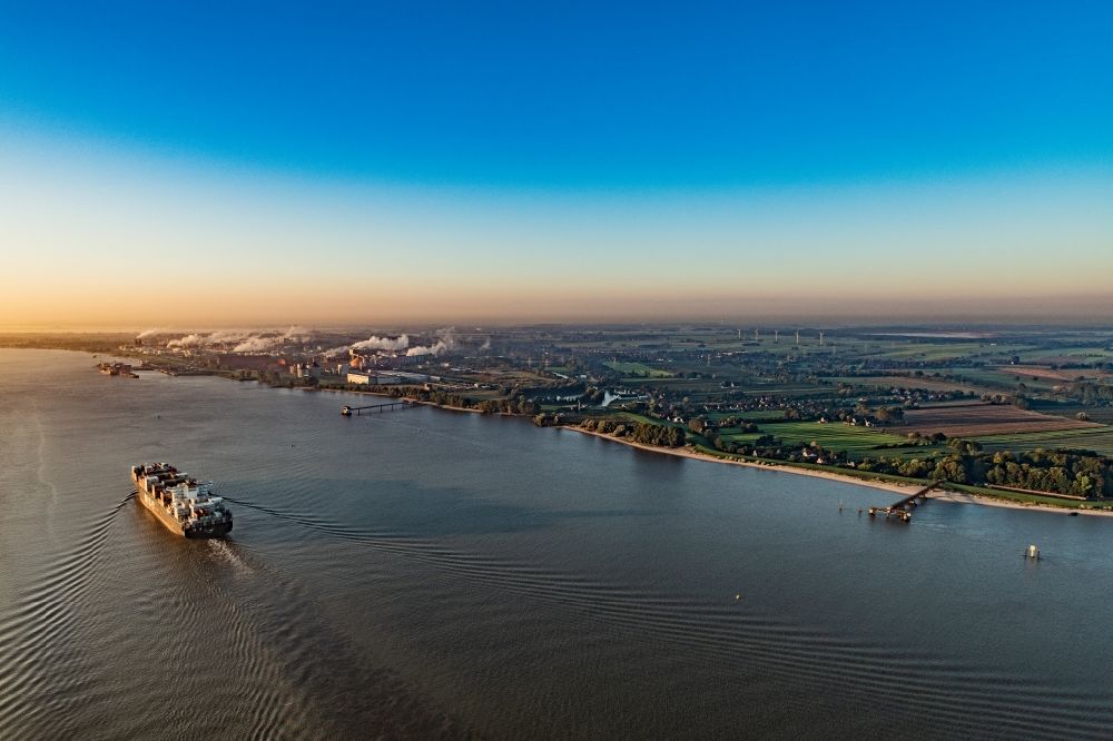 Aerial image Stade - Sailing container ship in fog Layer on Elbe river course in Drochtersen in the state Lower Saxony, Germany