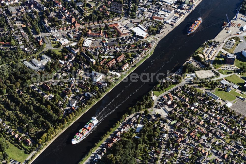 Aerial photograph Rendsburg - Sailing container ship on Nord-Ostsee-Kanal in Rendsburg in the state Schleswig-Holstein, Germany