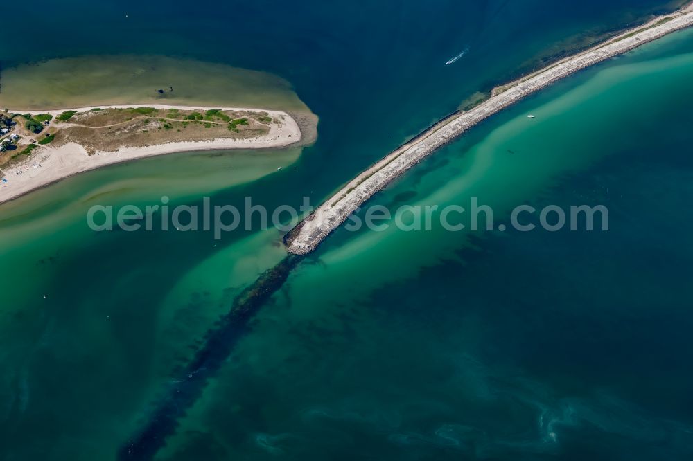 Aerial image Großenbrode - Track in the fairway of the waterways for shipping on the sea water surface of Ostsee on Zufahrt zum Grossenbroder Binnensee in Grossenbrode in the state Schleswig-Holstein, Germany