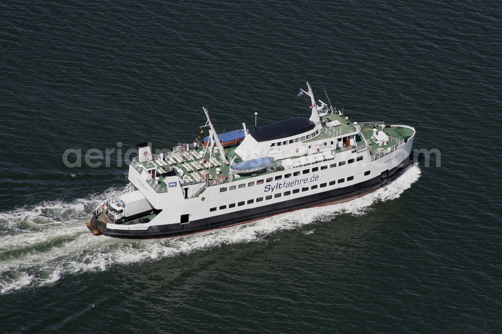 Havneby from above - Driving a car ferry in the North Sea at Havneby in Syddanmark, Denmark. The ferry Vikingland ( IMO 7349986 ) was one of formerly two ferries that commuted between the Danish island of Rom and List on the German island of Sylt
