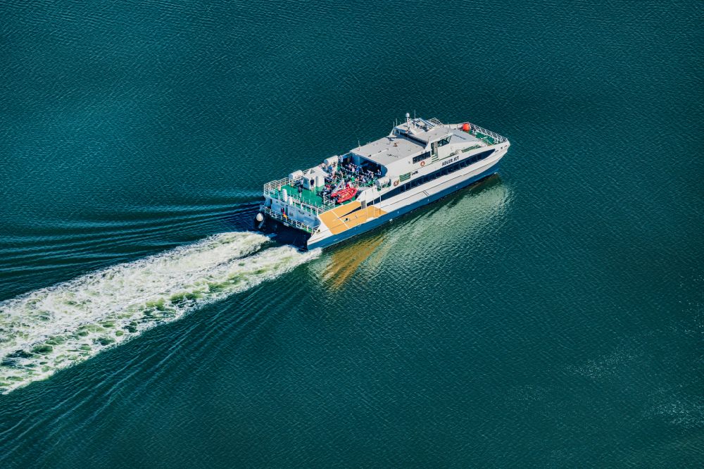 Aerial image Norderney - Trip of a ferry catamaran ship Adler Jet near Norderney in ferry traffic with Helgoland in the state of Lower Saxony, Germany
