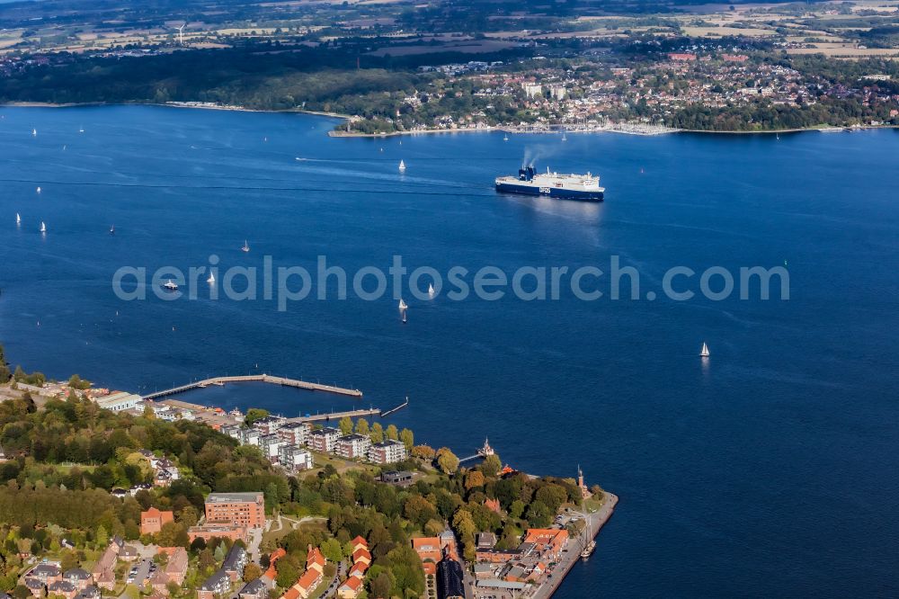 Kiel from above - First call of the ferry AURA SEAWAYS in the Kiel Fjord in Kiel in the state Schleswig-Holstein, Germany. The 230-metre-long RoPax ferry operated by the DFDS shipping company runs scheduled services across the Baltic Sea from Kiel to Klaipeda