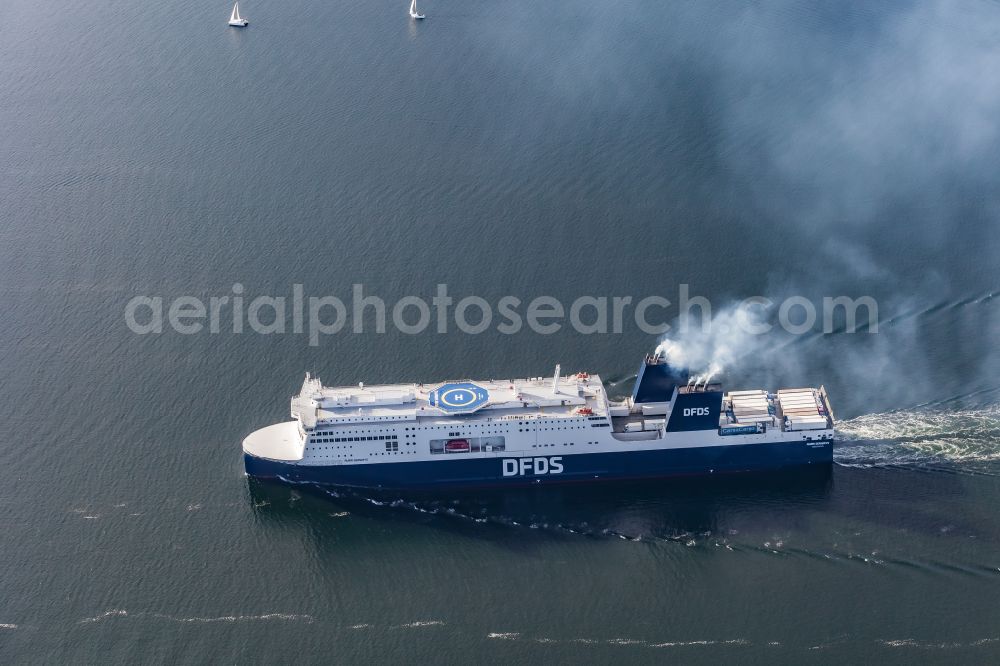 Aerial photograph Kiel - First call of the ferry AURA SEAWAYS in the Kiel Fjord in Kiel in the state Schleswig-Holstein, Germany. The 230-metre-long RoPax ferry operated by the DFDS shipping company runs scheduled services across the Baltic Sea from Kiel to Klaipeda