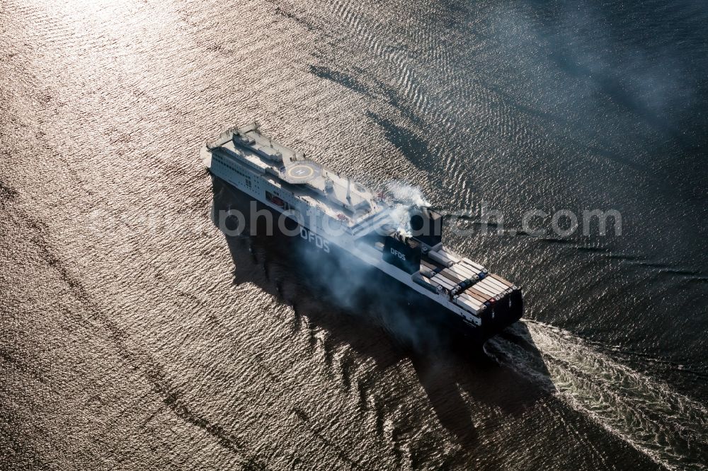 Heikendorf from the bird's eye view: Journey of the ferry ship AURA SEAWAYS on the Kieler Foerde in Kiel in the state Schleswig-Holstein, Germany. The 230-metre-long RoPax ferry operated by the DFDS shipping company operates scheduled services across the Baltic Sea
