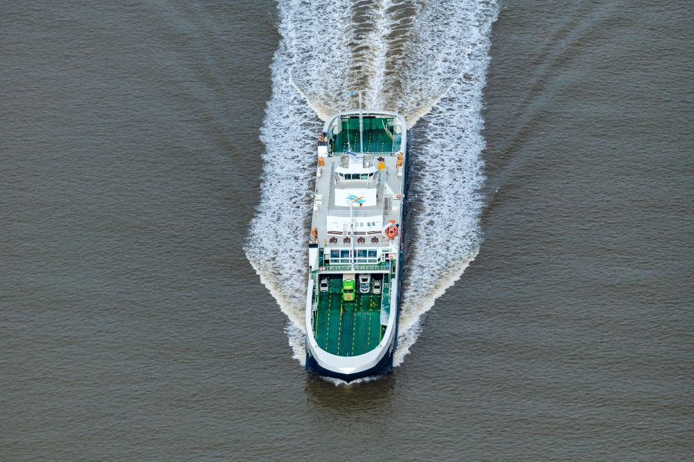 Brunsbüttel from above - Ride of a ferry of the Elbe ferry Elbferry Greenferry I in front of Brunsbuettel on the Elbe river in the state Schleswig-Holstein, Germany