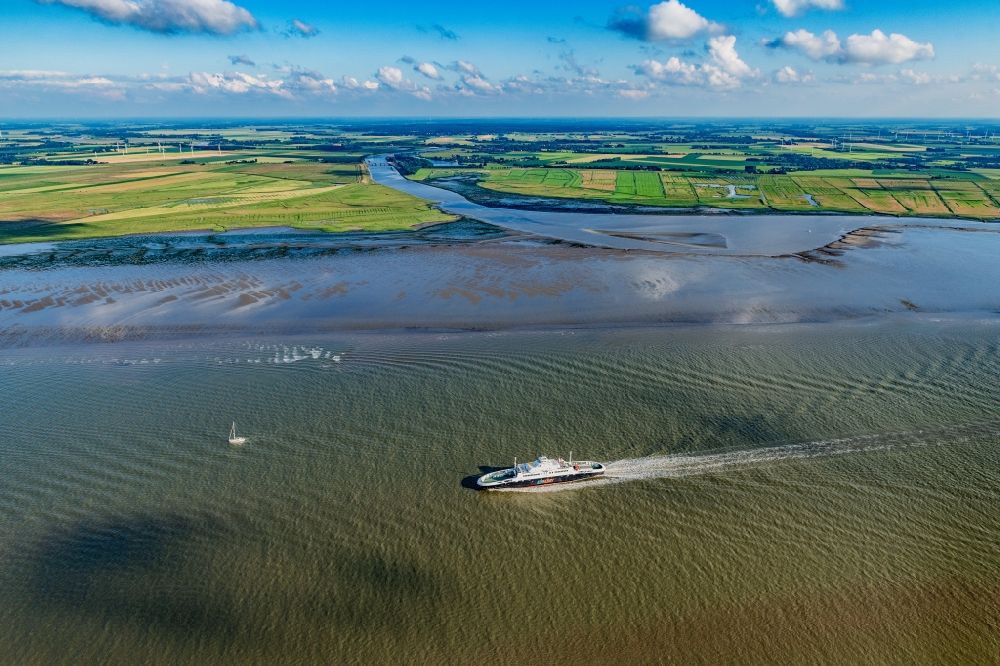 Balje from above - Ride of a ferry of the Elbe ferry Elbferry Greenferry I in front of Brunsbuettel on the Elbe river in the state Schleswig-Holstein, Germany