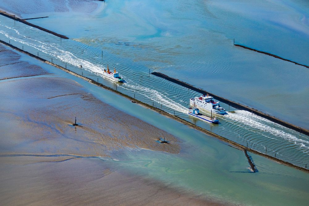 Aerial photograph Norden - Journey of a ferry ship of the AG Reederei Norden-Frisia ship Frisia 4 and the cargo ferry Inselfreight in Norden Norddeich in the state Lower Saxony, Germany