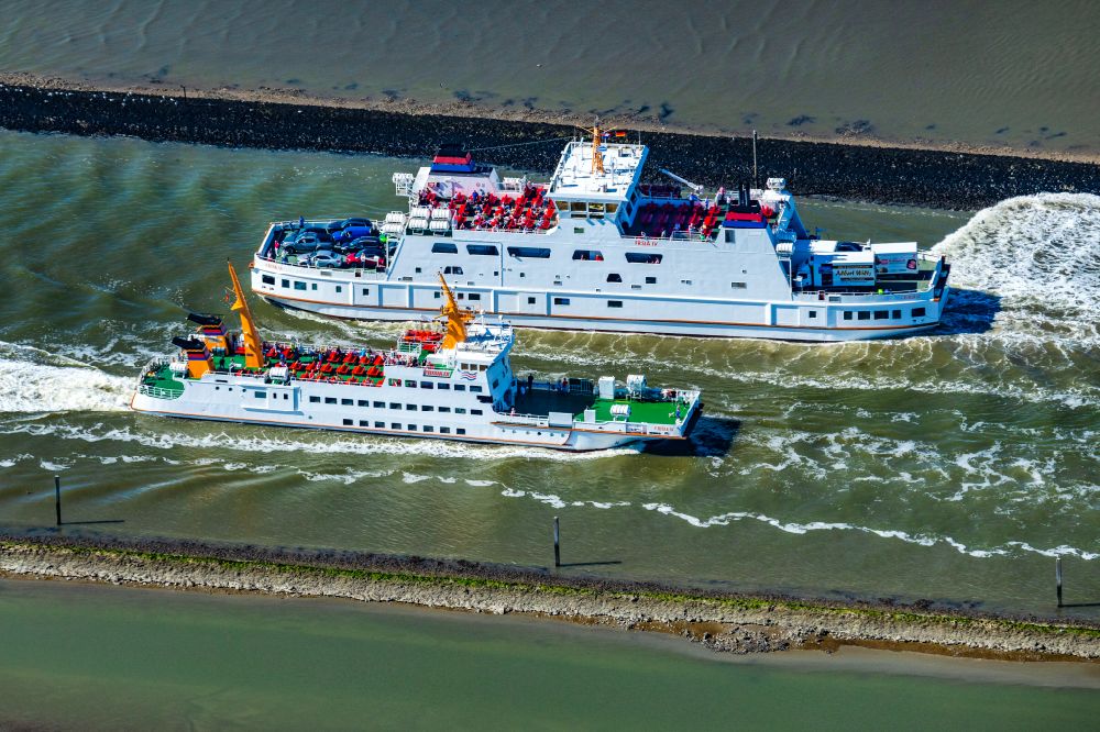 Aerial image Norden - Journey of a ferry ship of the AG Reederei Norden-Frisia ship Frisia 4 and the cargo ferry Inselfreight in Norden Norddeich in the state Lower Saxony, Germany
